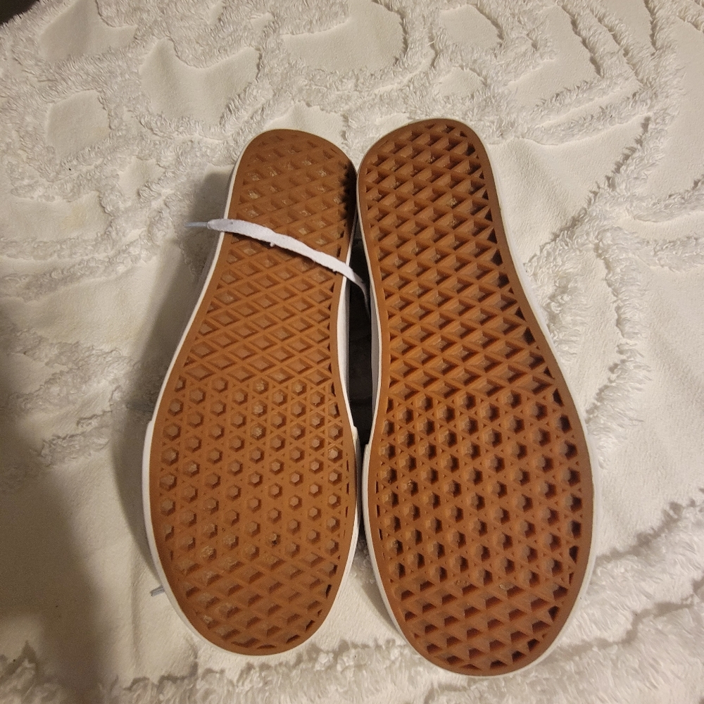 Black lace up checkered Vans. Men's 9 women's 10.5